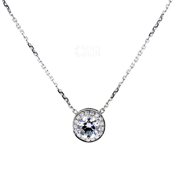 Classic 0.40ct diamond halo pendant is a staple in any jewellery box.  It is easy to match, layer and worn every day!