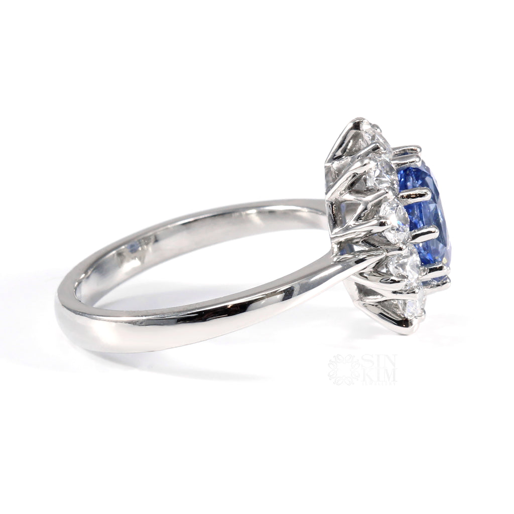 This blue sapphire engagement ring features a beautiful, custom made, hand finished undergallery.