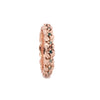 A rose gold eternity ring featuring a detailed floral pattern with small green gemstone accents, shown on a plain white background.