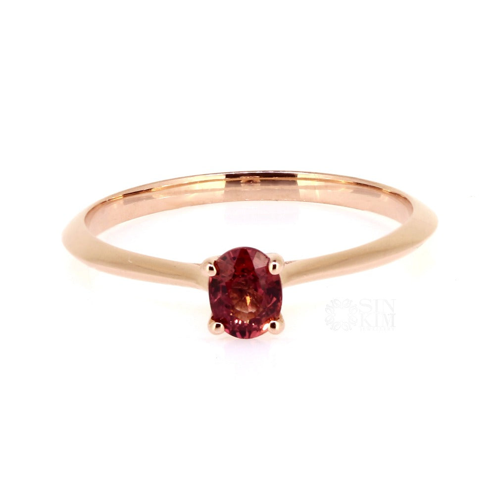 locally made ring with ethically sourced sapphire and rose gold
