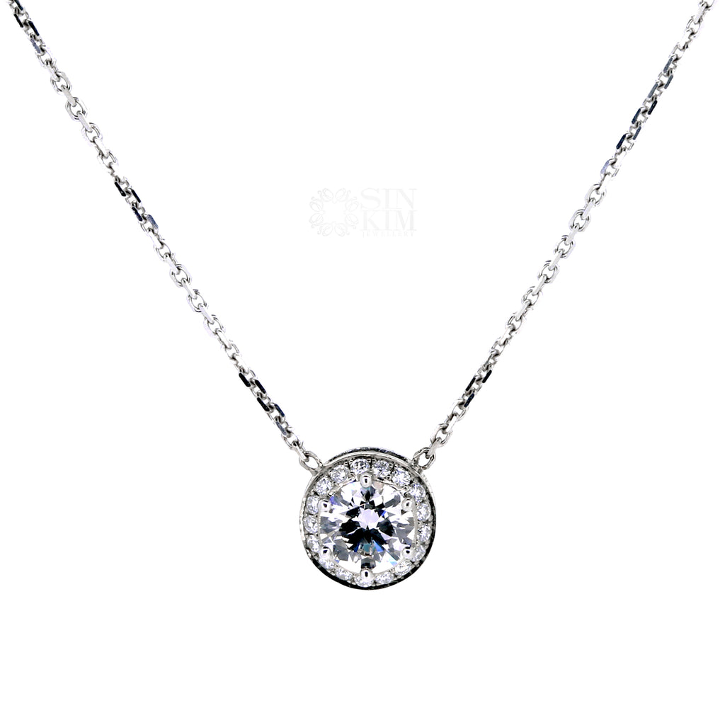 Classic 0.40ct diamond halo pendant is a staple in any jewellery box.  It is easy to match, layer and worn every day!   