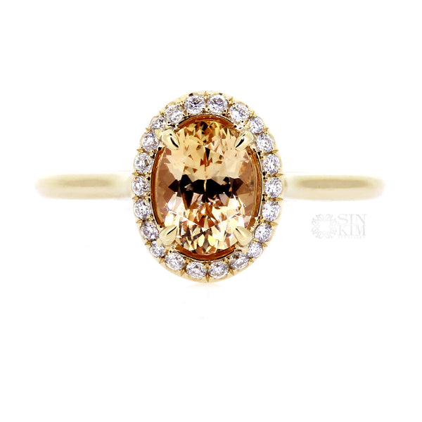 Halo ring with lovely, ethically sourced Apricot colour, 1.28ct Oval Sapphire, from Sri Lanka.  Made in Toronto, Canada