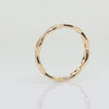 14k yellow gold open wave band with millgrain video of ring spinning