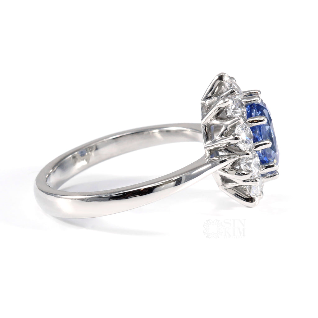 This blue sapphire engagement ring features a beautiful, custom made, hand finished undergallery. 